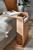 Picture of Side Table next to  bed slotted over the seat of a sofa Ideal for small rooms